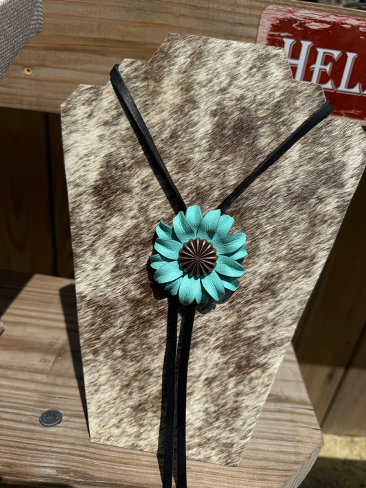 Leather flower bolo with copper center