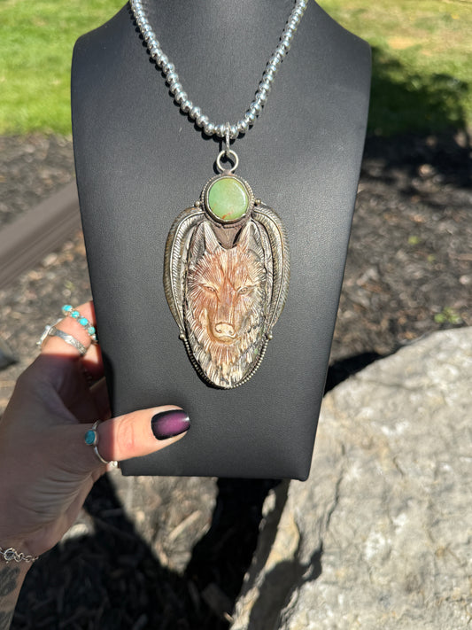 Carved wolf necklace