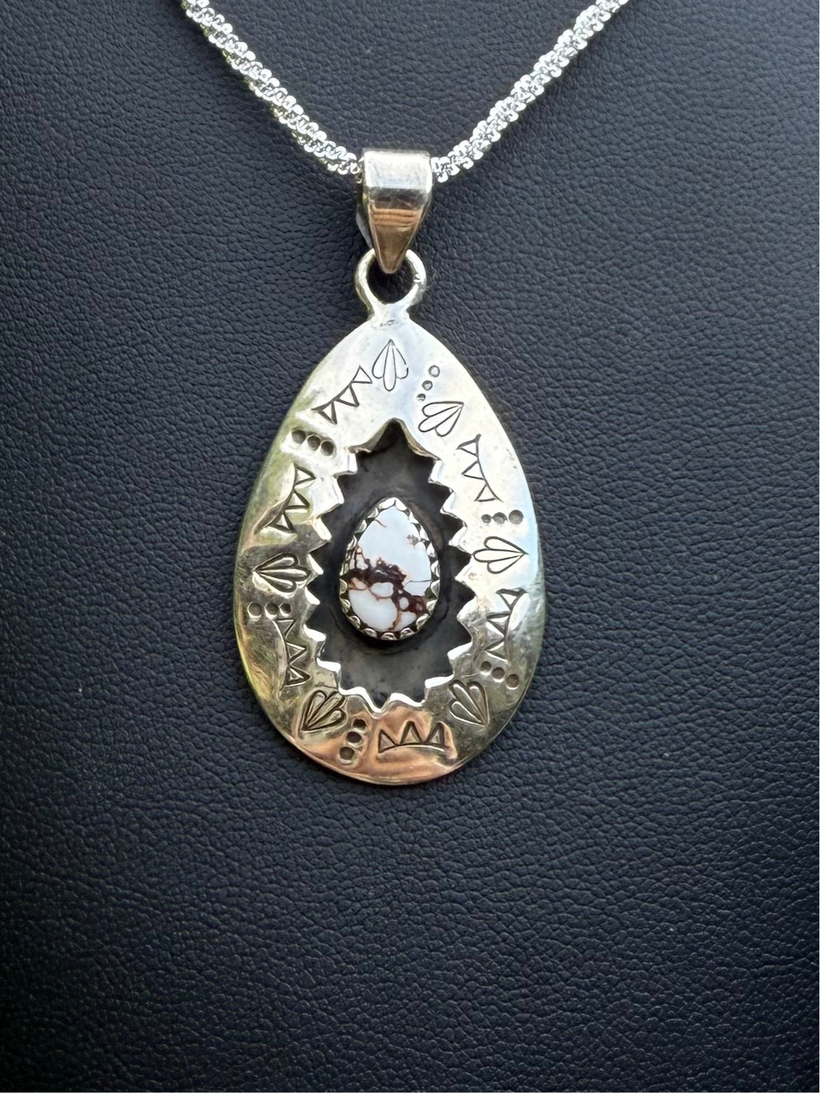 White buffalo pendant