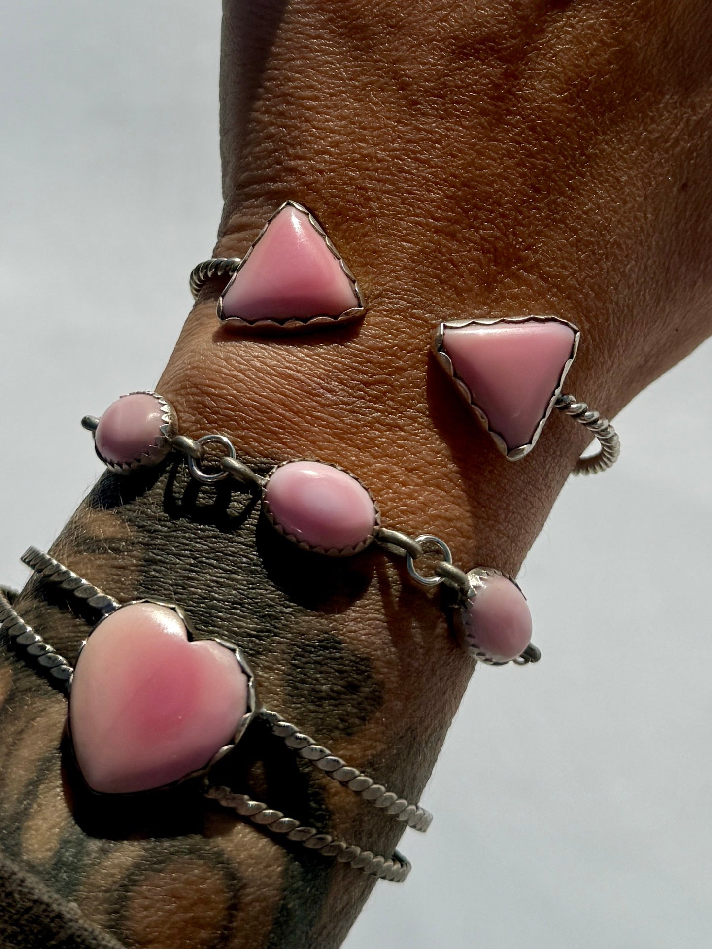Pink conch triangle cuff