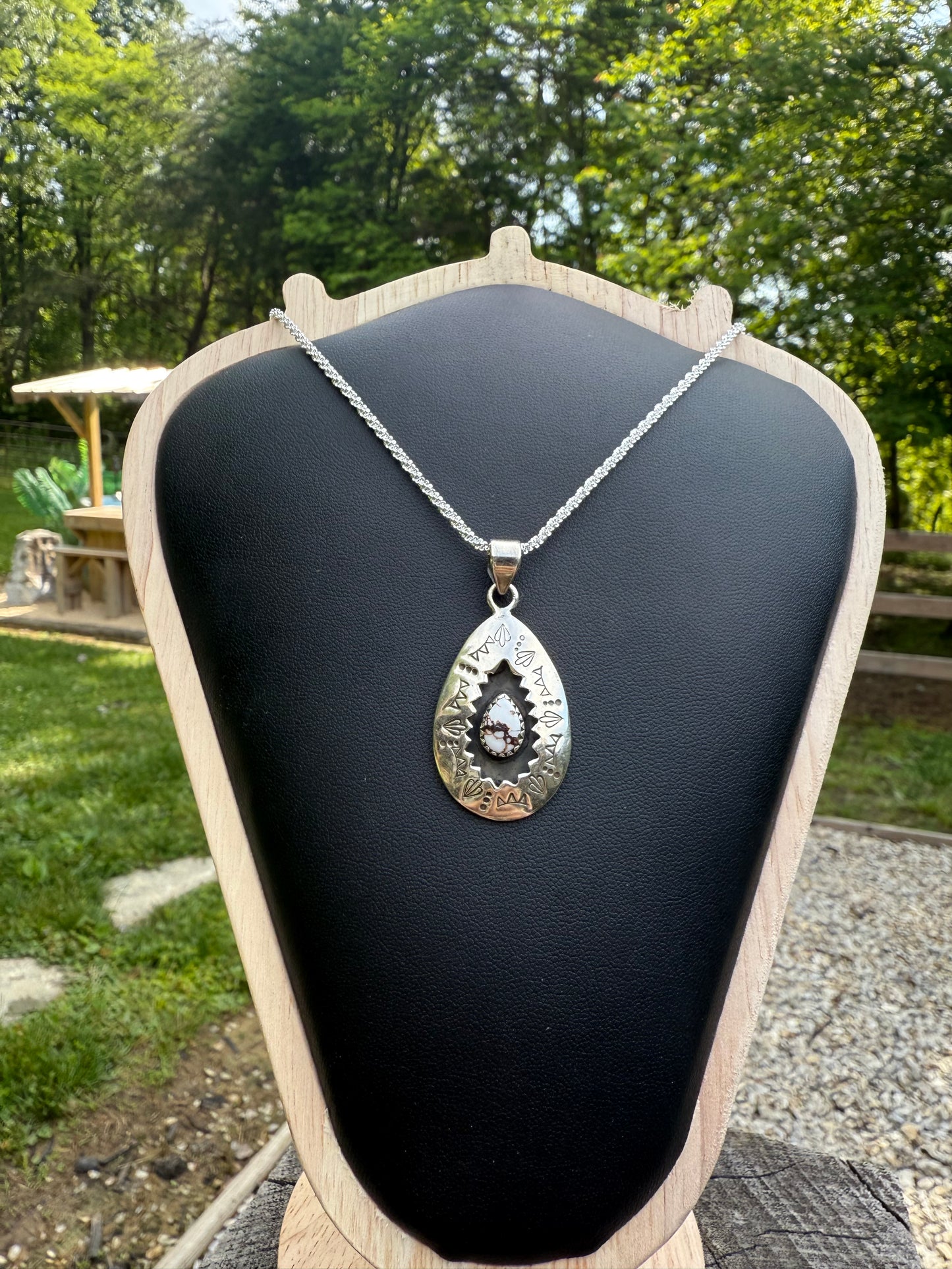 White buffalo pendant